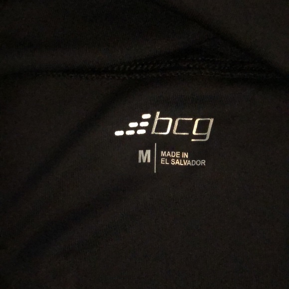 Black sports tank with mesh neckline. - Picture 4 of 6